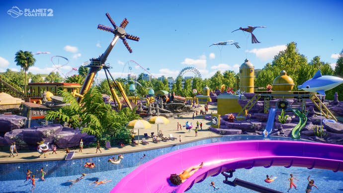 Planet Coaster 2 screenshot showing wide view of a water park